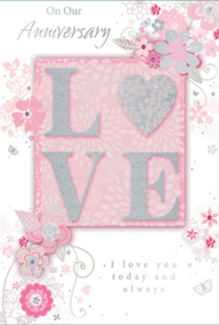 The anniversary card depicted here has the air of something thoughtfully chosen in Stratford and saved for years to come, its design balancing romance and restraint. At its heart is the word LOVE, set in clear, uppercase letters that stand a little proud of the card, creating a gentle relief. These letters glimmer with a coating of fine glitter, where blush pink and pearl tones blend softly with hints of silver, reminiscent of the way city lights glint off the glass around Westfield Stratford City at dusk. The backdrop is a muted, dusky pink, giving a quietly romantic base that feels neither too bright nor too pale. Around the central word, the surface of the card is adorned with a halo of illustrated flowers, leaves, and twining stems. Each bloom is rendered with a light hand-thin outlines, soft shading in blush, mauve, and off-white, and occasional flickers of silver at the edges of petals or along a vein. The florals are spaced so that they seem to float rather than crowd, very much like delicate stems placed in just the right positions in a hand-crafted anniversary bouquet. Scrolling vines and little dotted accents arc gracefully across the design, adding a sense of rhythm and movement, as though a gentle breeze were passing through a garden off Stratford High Street. The elegant script of the message, perhaps reading of love today and always, appears in a subtle, flowing type that suits the card's refined character. Overall, the card suggests tenderness, thoughtful attention, and that quiet joy that settles over a couple celebrating another year together with flowers delivered locally.
